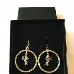 Sterling silver hoop earrings with angels.